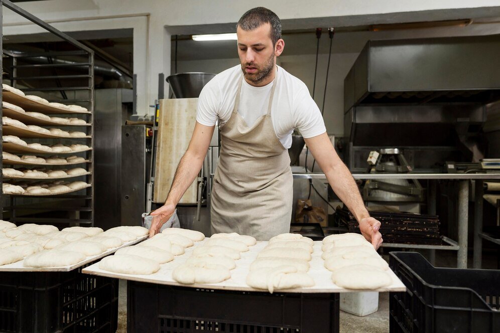 man-working-bread-bakery_23-2148983524